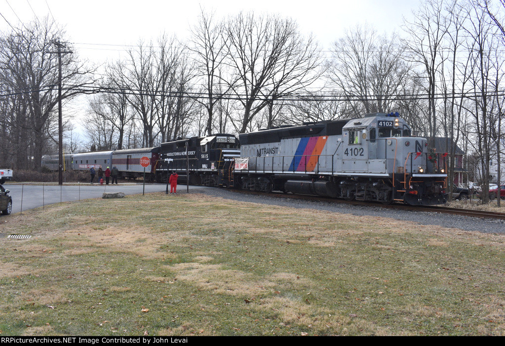 The 4102 and 5615 leading the train across Boyd St Xing